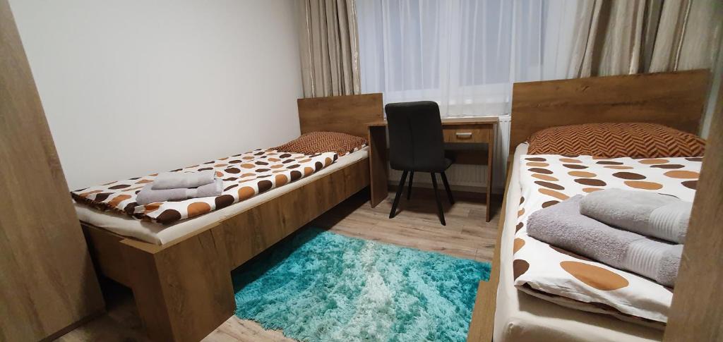Postel nebo postele na pokoji v ubytování Ubytovanie HK