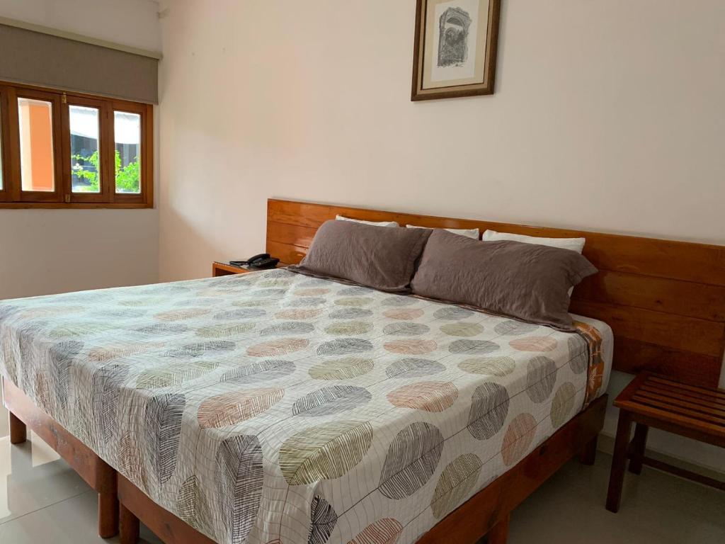 Postel nebo postele na pokoji v ubytování HOTEL POSADA DEL SOL