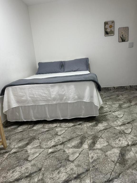 Postel nebo postele na pokoji v ubytování FRAN's - HOSPEDAGENS