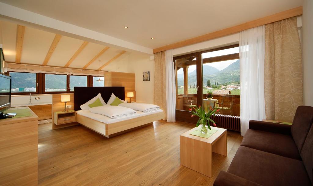 Postel nebo postele na pokoji v ubytování Hotel und Residence Johanneshof