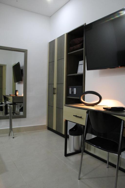 Kuchyň nebo kuchyňský kout v ubytování Hotel Merlott Lleras