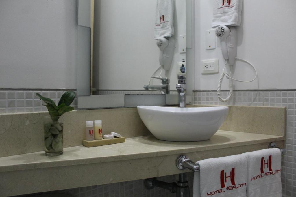 Koupelna v ubytování Hotel Merlott Lleras