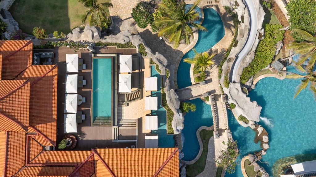 an aerial view of a resort with a pool at Hilton Bali Resort in Nusa Dua