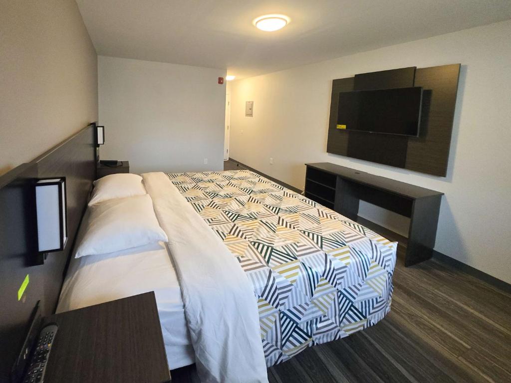 Postel nebo postele na pokoji v ubytování Motel 6 East Windsor, NJ Hightstown
