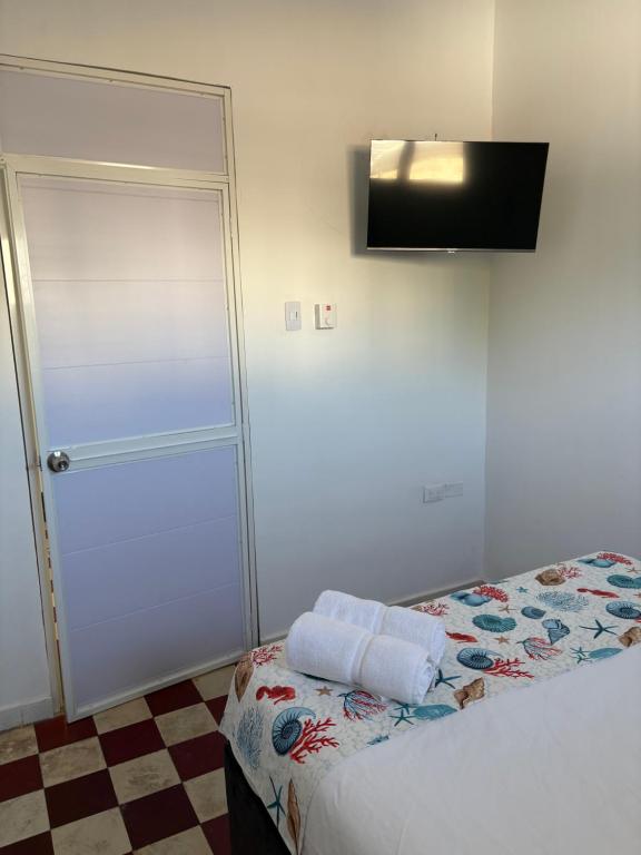 Voodi või voodid majutusasutuse Casa Turbay toas