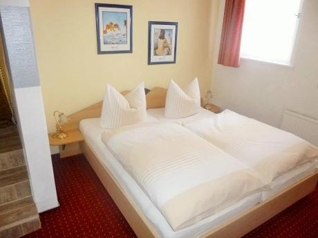 Postel nebo postele na pokoji v ubytování Hotel Waldhaus-Hutzelhöh