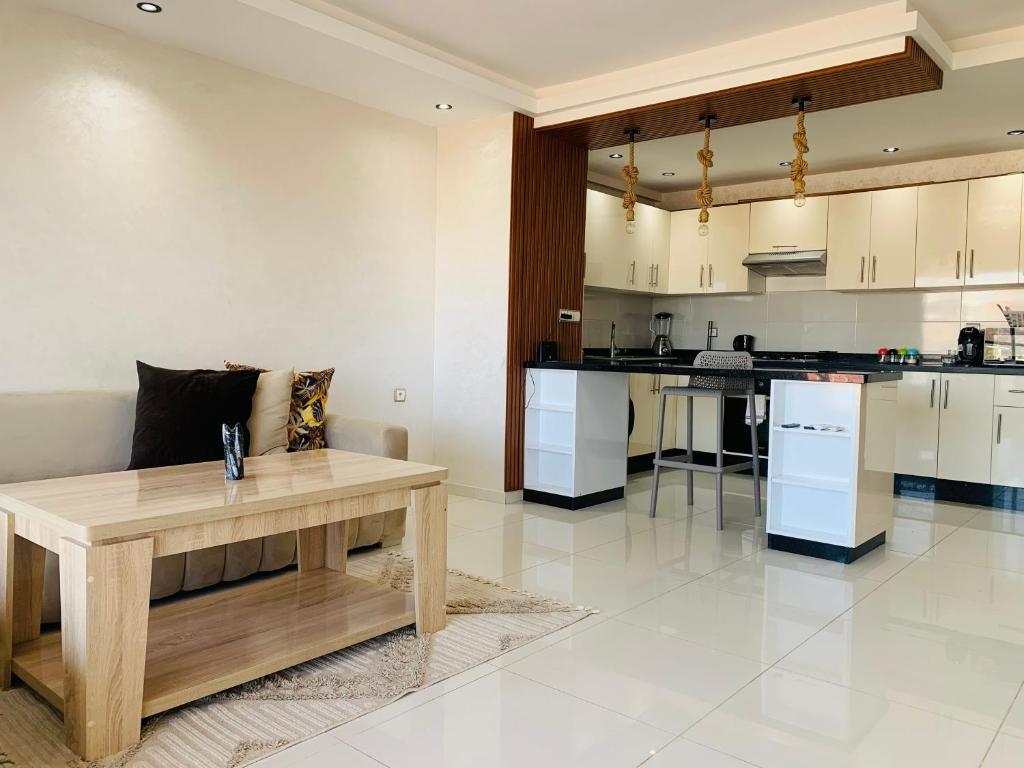 Kuchyň nebo kuchyňský kout v ubytování Appartement moderne avec une vue spectaculaire sur l océan