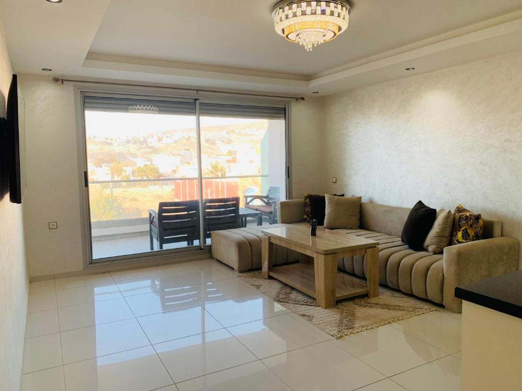 Posezení v ubytování Appartement moderne avec une vue spectaculaire sur l océan