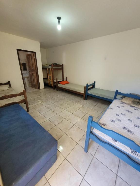 Postel nebo postele na pokoji v ubytování Hostel Tabapiri