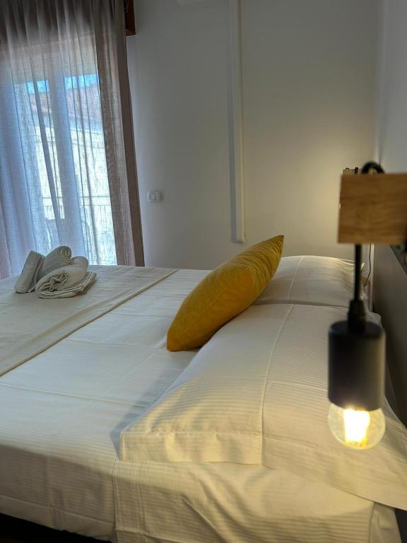 Postel nebo postele na pokoji v ubytování VitaLenta Rooms