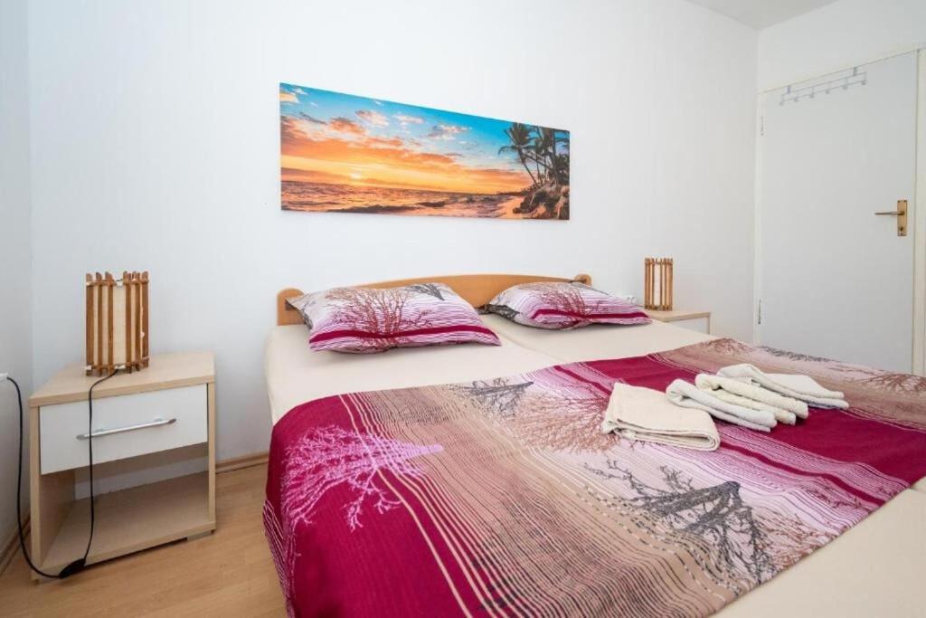 Posteľ alebo postele v izbe v ubytovaní Apartments Gavro