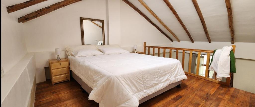 Postel nebo postele na pokoji v ubytování Loft Casa Yucay