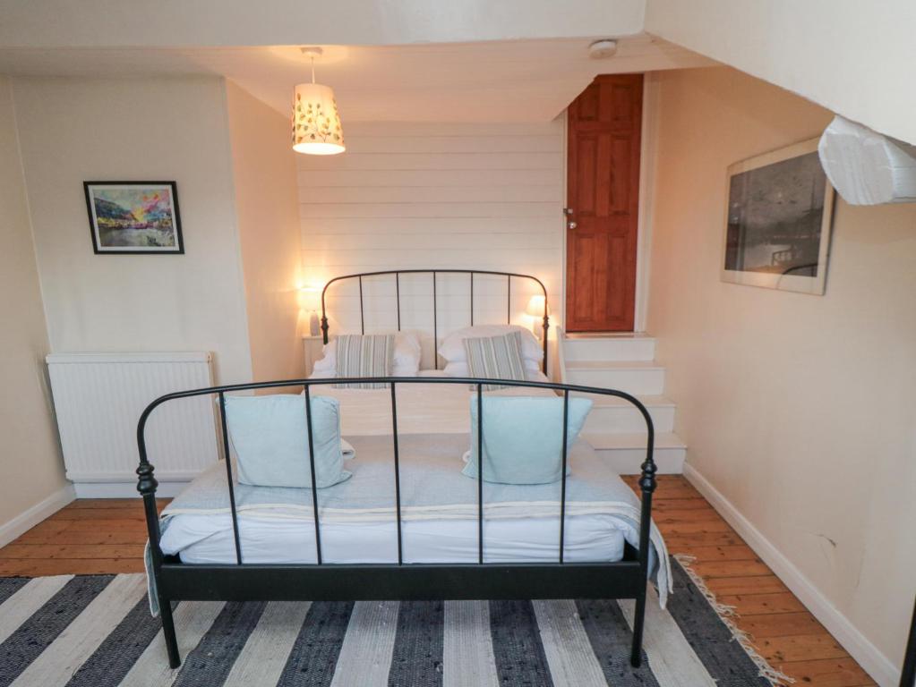 Postel nebo postele na pokoji v ubytování Salmon Cottage