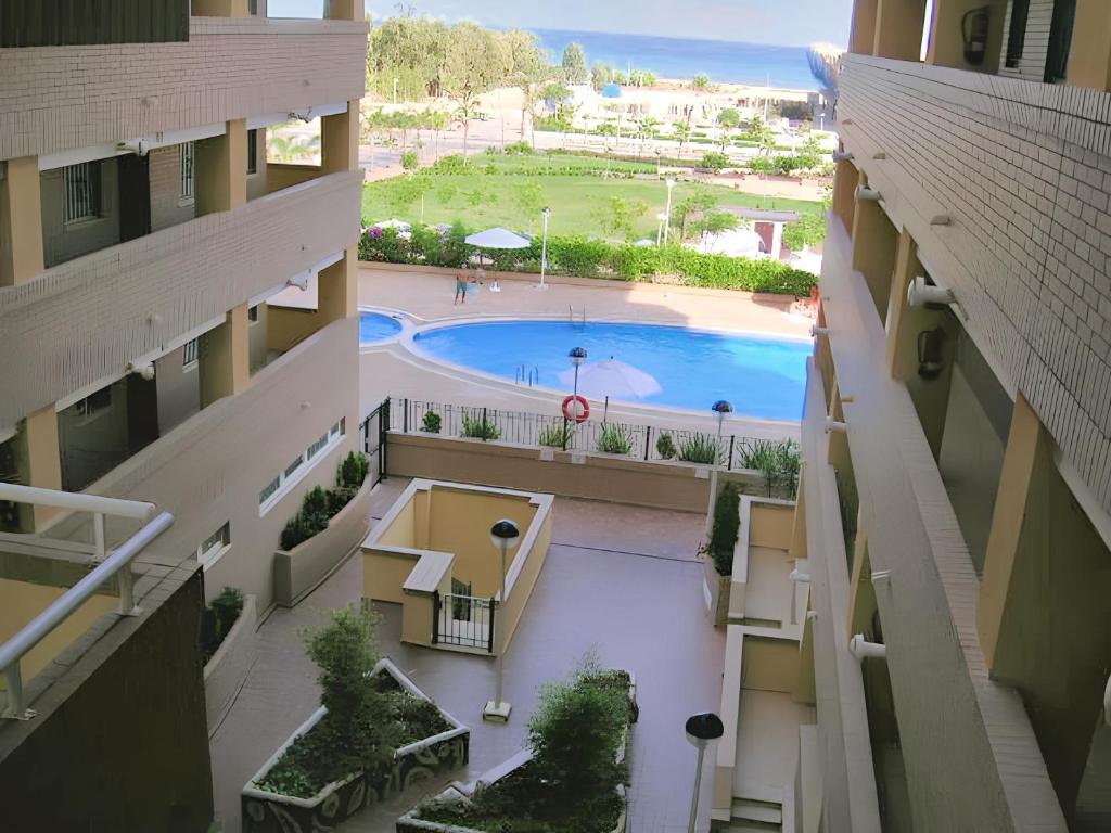 Bazén v ubytovaní Modern apartment in Oropesa, 60 m², with shared pool alebo v jeho blízkosti