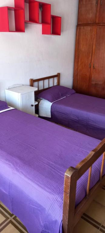 Postel nebo postele na pokoji v ubytování Descanso