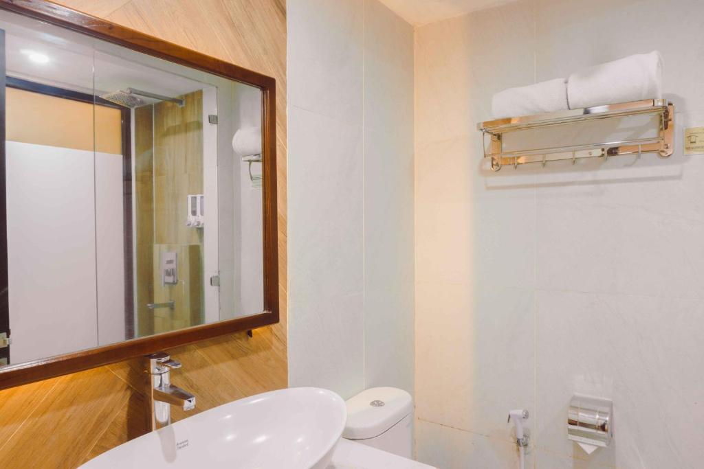 Koupelna v ubytování Fahira Hotel Syariah Bukittinggi