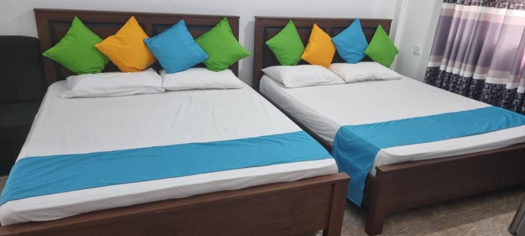 Postel nebo postele na pokoji v ubytování PEREGRINE Villa