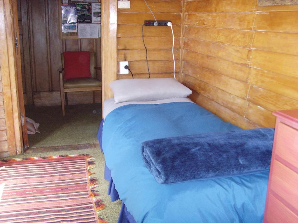 Postel nebo postele na pokoji v ubytování Big Tree Lodge Methven