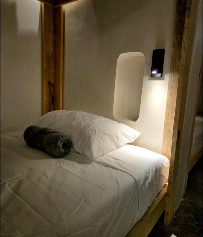 Postel nebo postele na pokoji v ubytování HOM Hostel Boutique