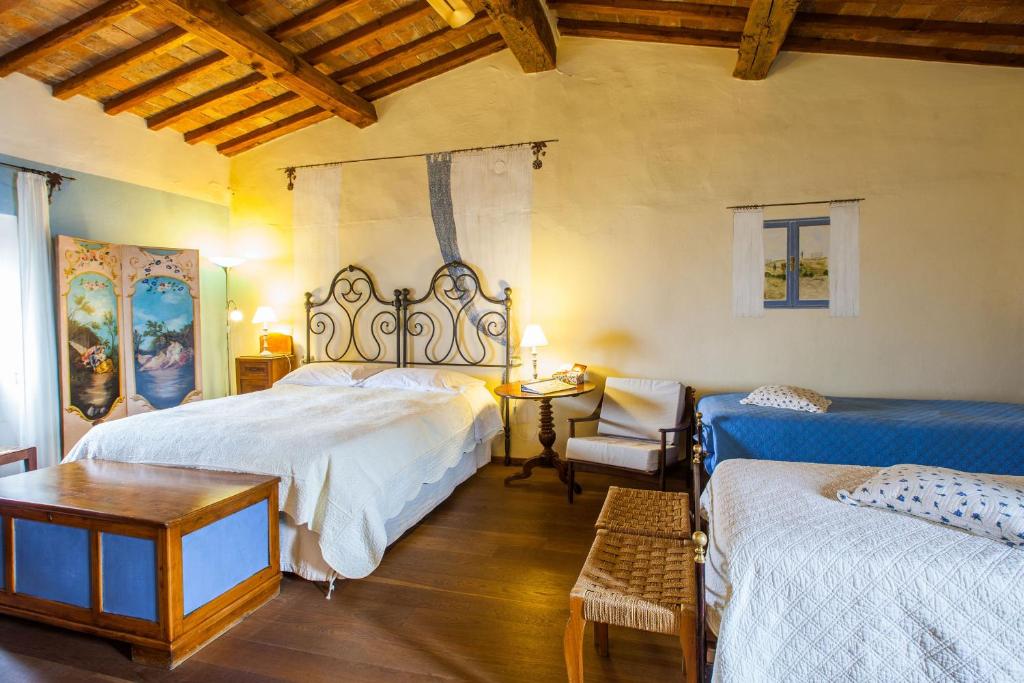 Postel nebo postele na pokoji v ubytování B&B Le Due Volpi
