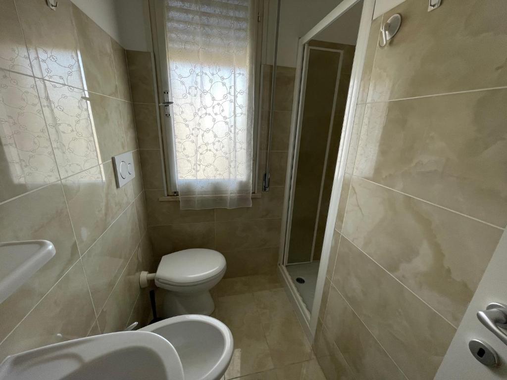 Koupelna v ubytování Residenza Lido adriano baia tartaruga