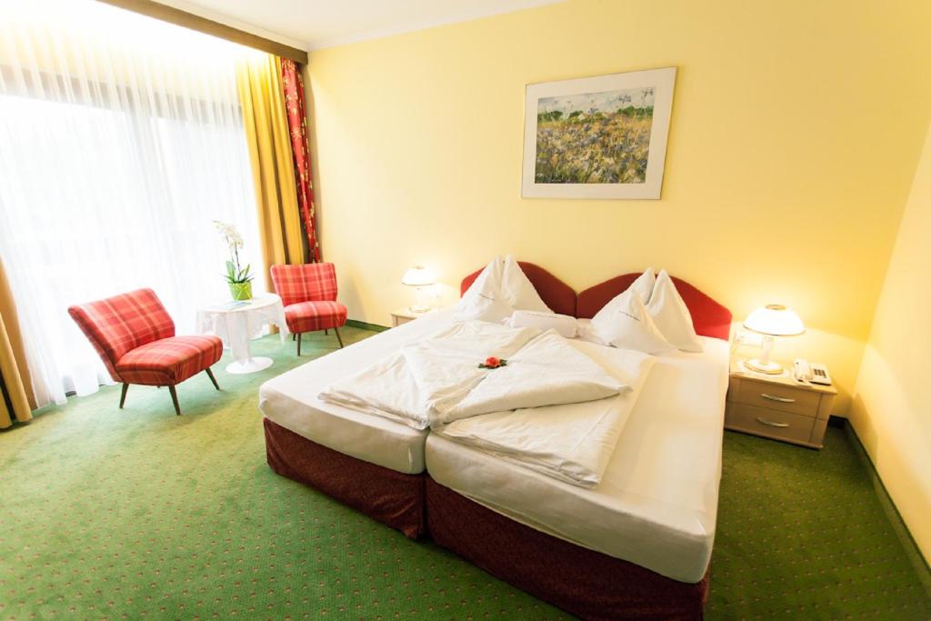 Een bed of bedden in een kamer bij Kolmhof