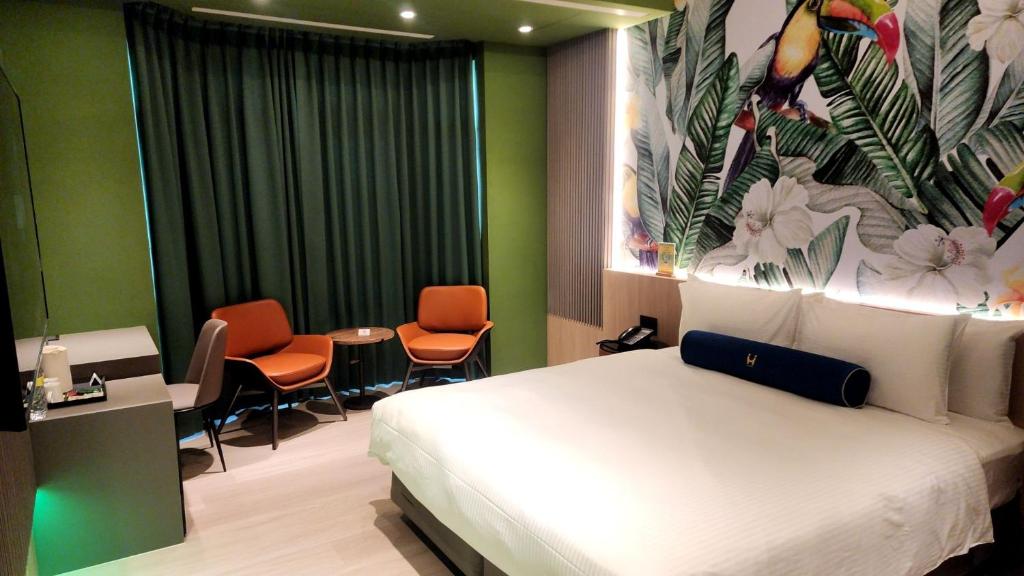 Postel nebo postele na pokoji v ubytování Jiati Business Motel