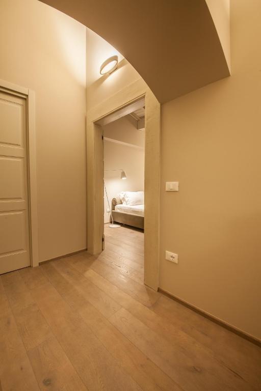 Posteľ alebo postele v izbe v ubytovaní B&B Antico Brolo
