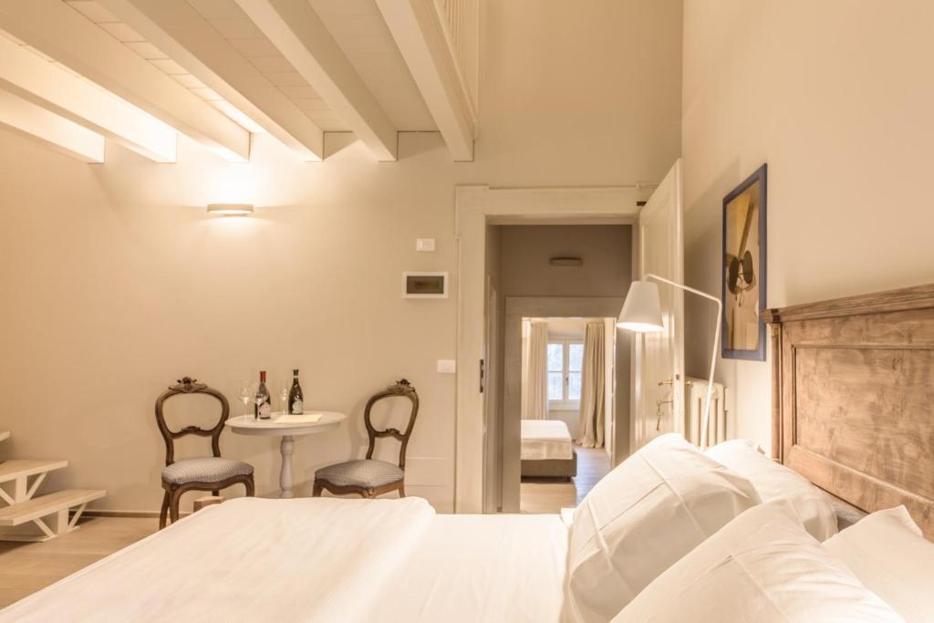 Posteľ alebo postele v izbe v ubytovaní B&B Antico Brolo