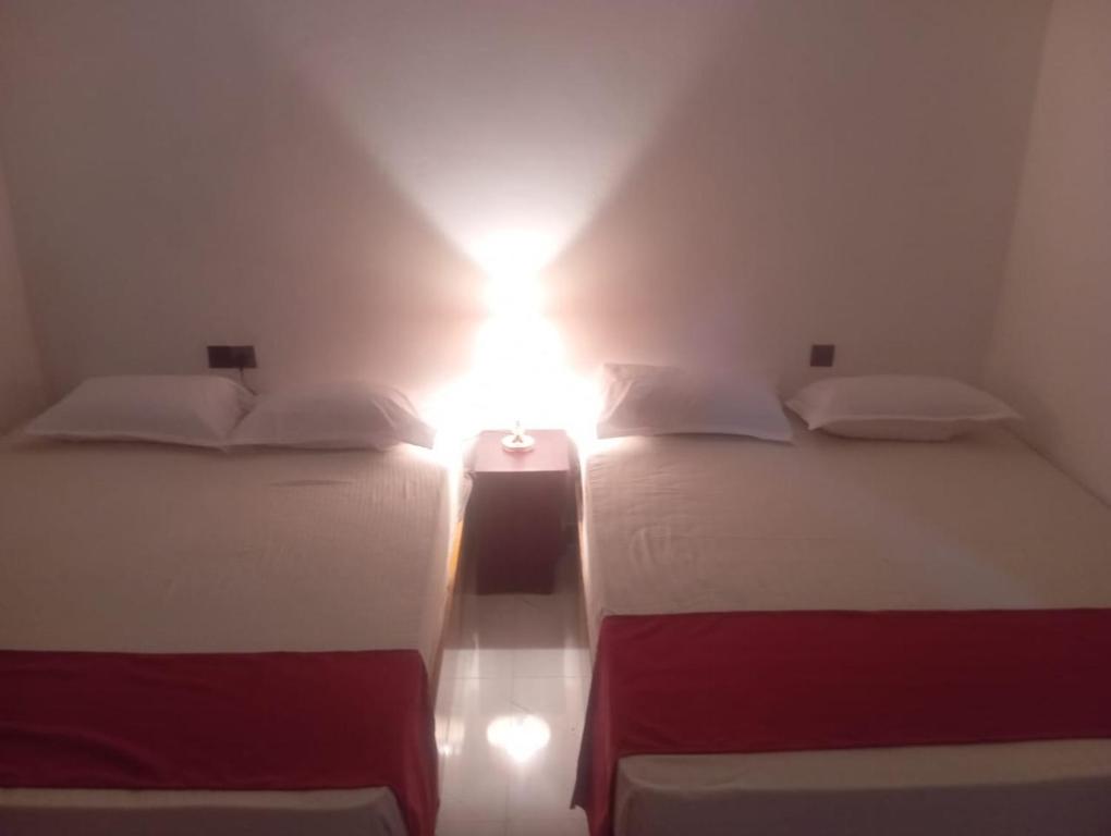 Postel nebo postele na pokoji v ubytování Alankulama Wana Resort
