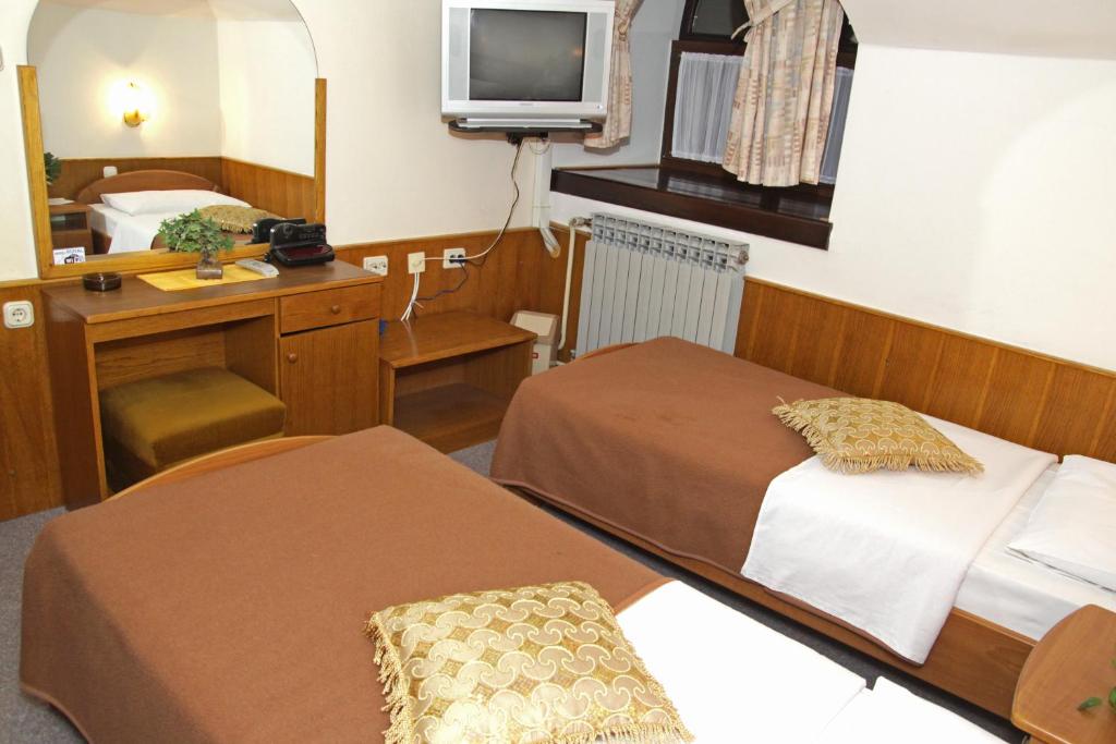 Postel nebo postele na pokoji v ubytování Guest house Royal