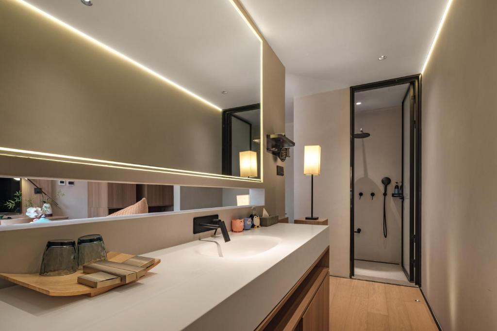 Fotografie z fotogalerie ubytování Qingdao Wushe Yujianshanju Tangchi Seaview Hotel v destinaci Čching-tao