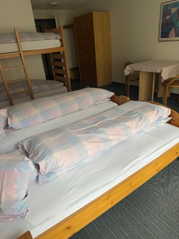 Postel nebo postele na pokoji v ubytování Hotel ilufa