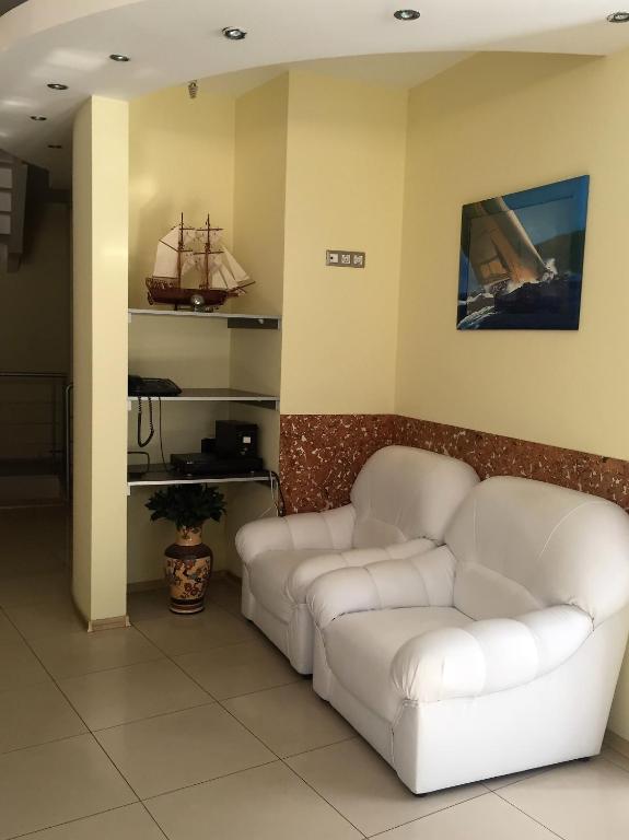Posezení v ubytování Consul Hotel Консул