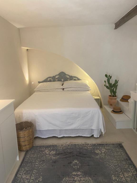Ένα ή περισσότερα κρεβάτια σε δωμάτιο στο Casa Buganville