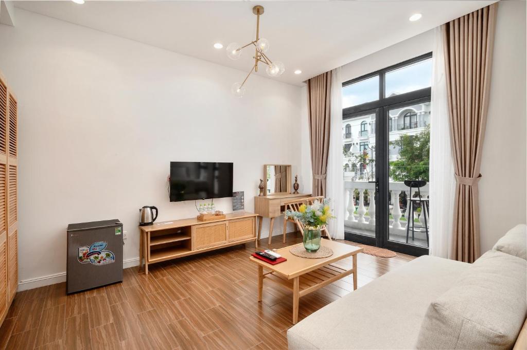 TV a/nebo společenská místnost v ubytování Aqua Vista Phu Quoc