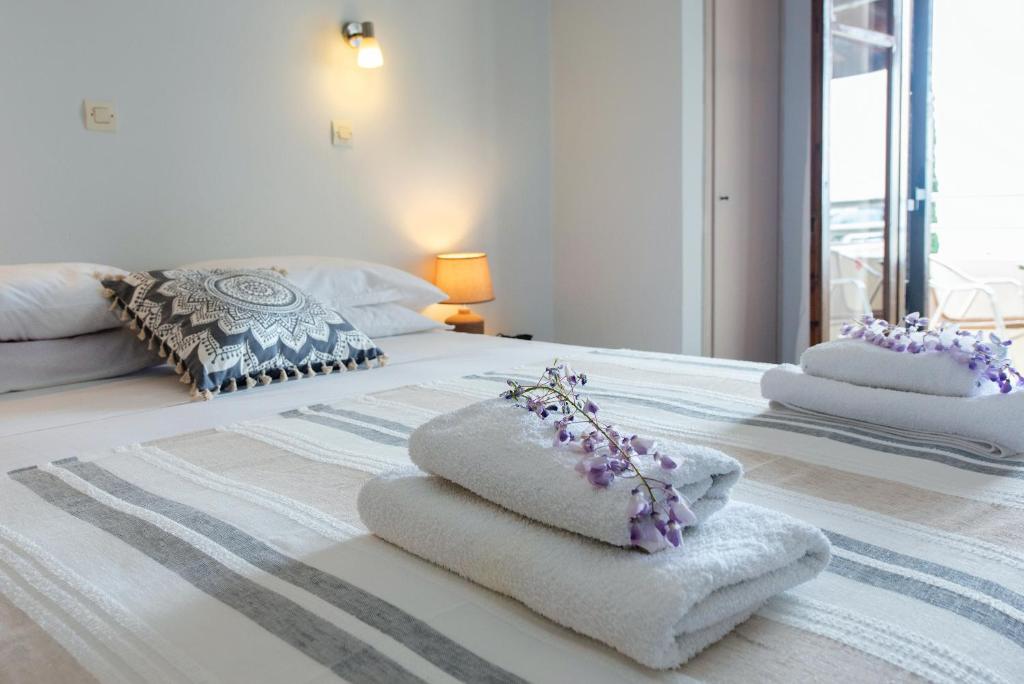 Postel nebo postele na pokoji v ubytování corfu barbati B&B