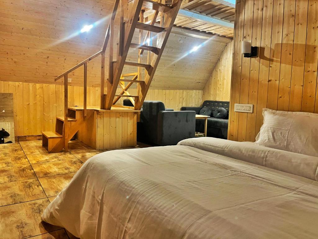 Postel nebo postele na pokoji v ubytování Winter Soul Cottages