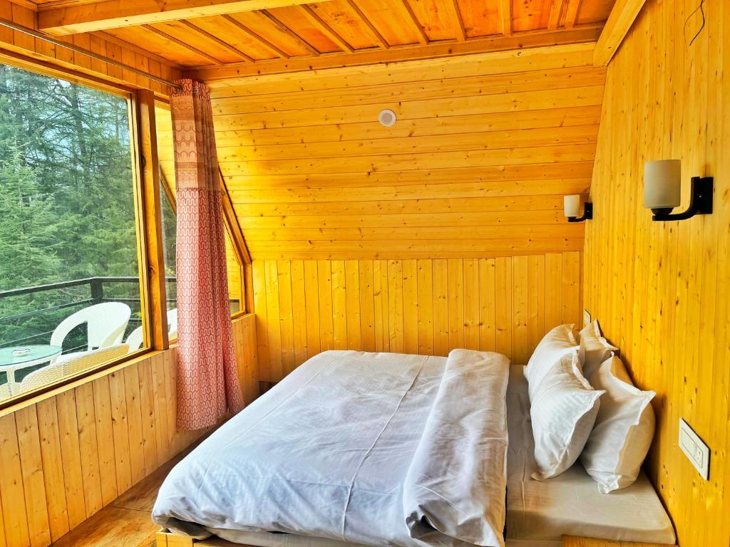 Postel nebo postele na pokoji v ubytování Winter Soul Cottages