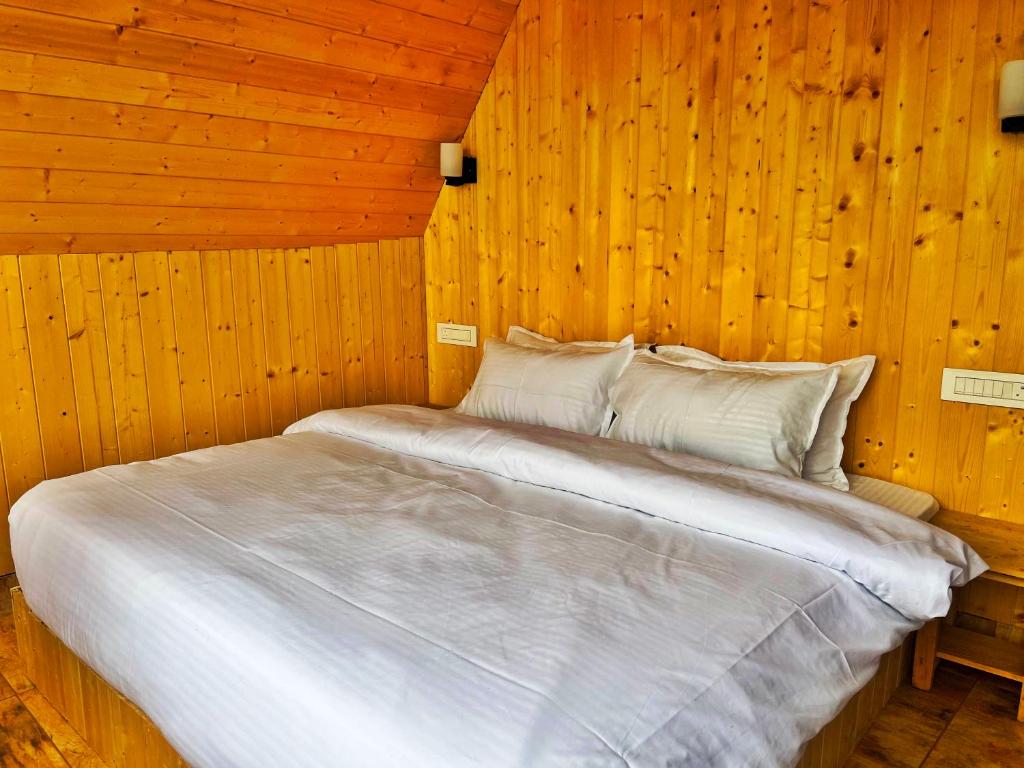 Postel nebo postele na pokoji v ubytování Winter Soul Cottages