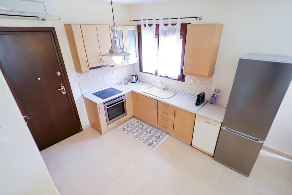 Kuchyň nebo kuchyňský kout v ubytování Guedin Sea Side Maisonette, Nikiti