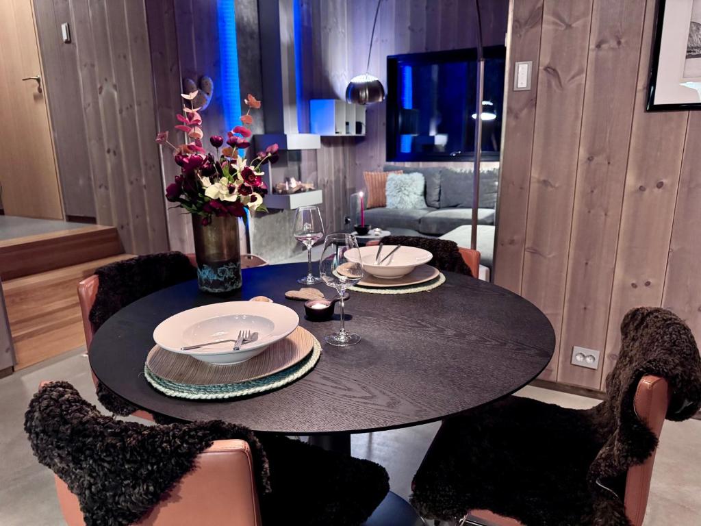 TV a/nebo společenská místnost v ubytování Håkøya Lodge