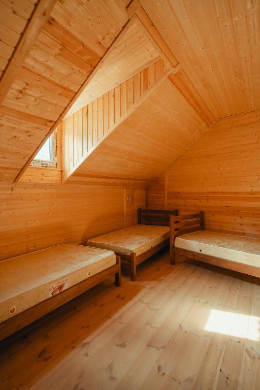 Postel nebo postele na pokoji v ubytování Vichnashi