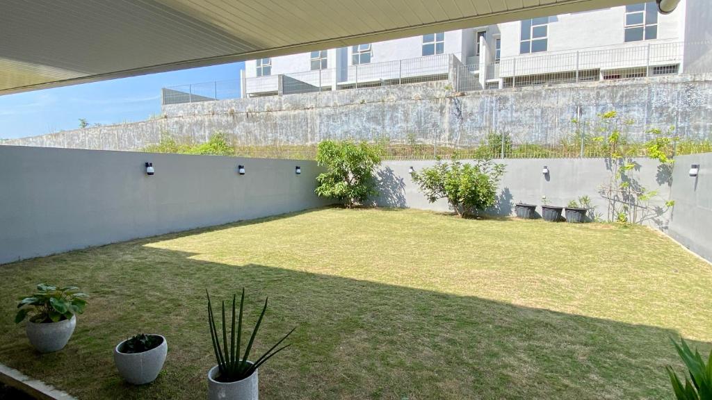 A garden outside Stylish home with amazing pool views