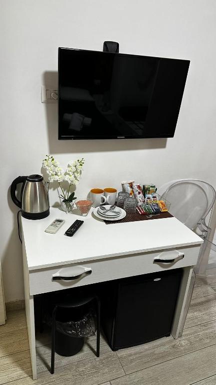 Telewizja i/lub zestaw kina domowego w obiekcie Napoli Relais