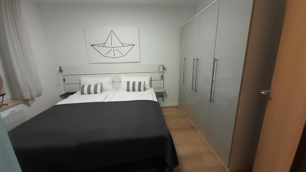 Postel nebo postele na pokoji v ubytování Badhotel Appartementen Callantsoog