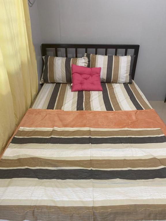 Postel nebo postele na pokoji v ubytování restfull transients inn