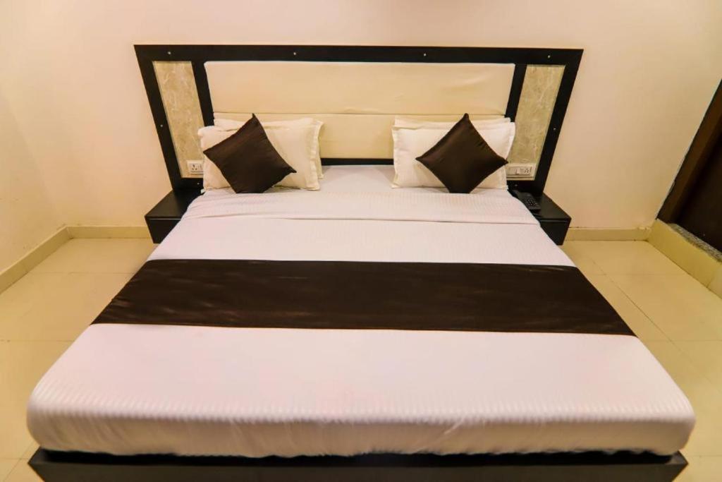Postel nebo postele na pokoji v ubytování Hotel Elite inn