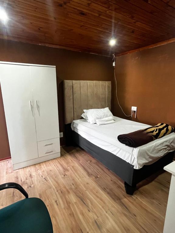 Postel nebo postele na pokoji v ubytování VB Accomodation (STATION HOME)