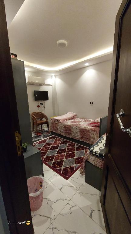 Postel nebo postele na pokoji v ubytování استديو فندقي